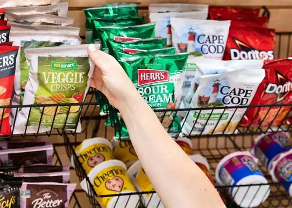 Hand reaching for chips